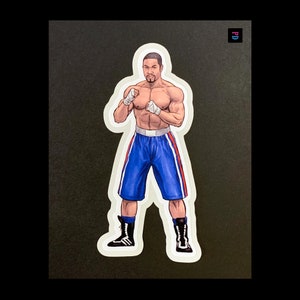 Autocollant de personnage de champion de boxe américain - Coupe bise mat/brillant résistant aux intempéries - 3 tailles