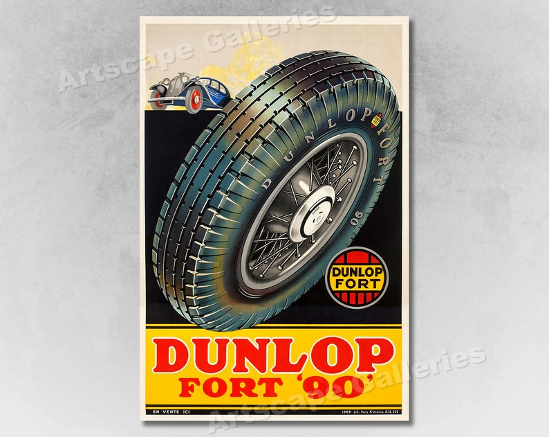 May include: Vintage poster advertising Dunlop Fort 90 tires. The poster features a close-up of a tire with a spoke wheel, and a smaller image of a car in the background. The text "Dunlop Fort 90" is in red and yellow, and the text "Dunlop Fort" is in red and white.