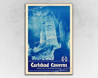 May include: A vintage travel poster for Carlsbad Caverns National Park in New Mexico. The poster features a blue and white image of the cave formations with the text "Carlsbad Caverns" and "Santa Fe" in white.