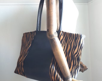 Leather shopper bag with hair on hide in tiger print.