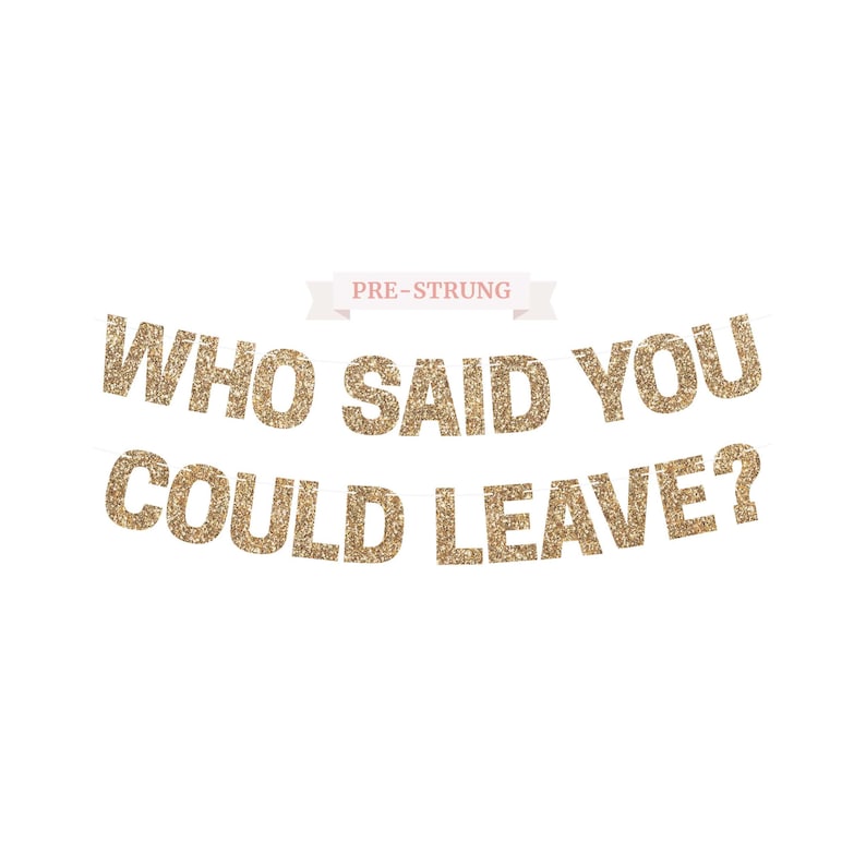 Gold glitter "WHO SAID YOU COULD LEAVE?" retirement banner for retirement party decorations.