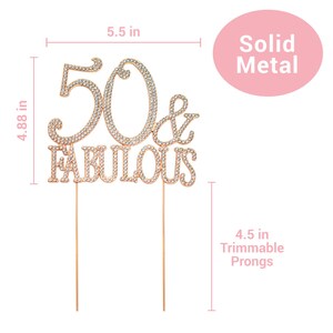 May include: Gold cake topper with rhinestones that says "50 & Fabulous". The topper is 5.5 inches wide and 4.88 inches tall. It has two 4.5 inch trimmable prongs.