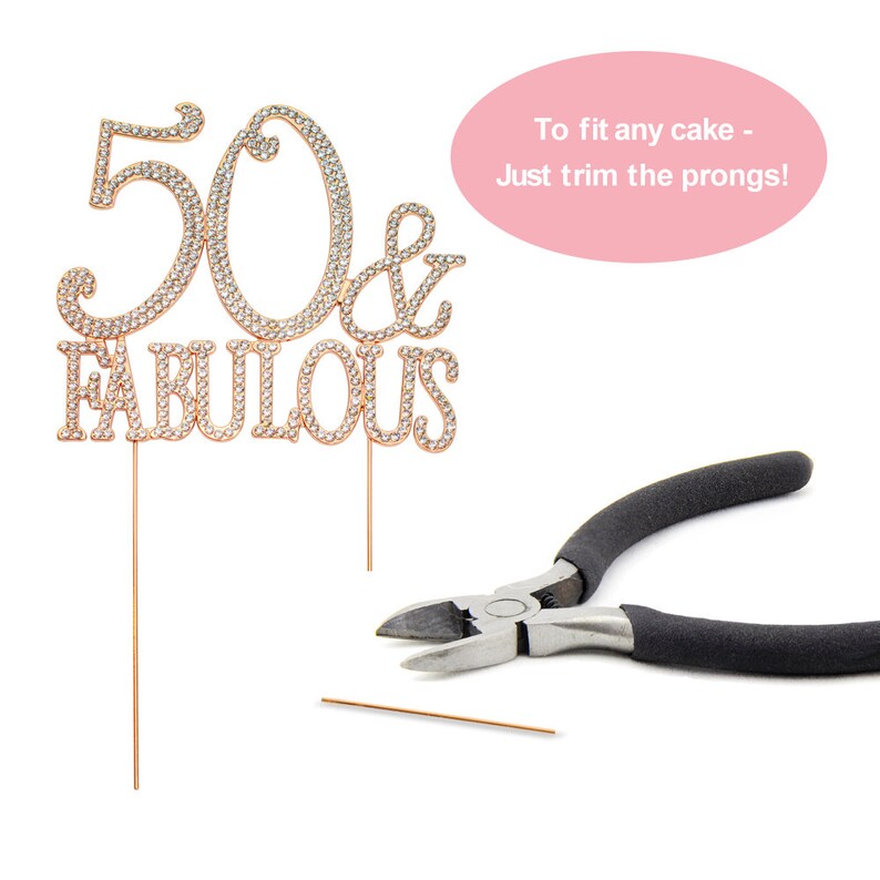 May include: Gold cake topper with rhinestones that says "50 & Fabulous". The topper comes with two prongs that can be trimmed to fit any cake. A pair of wire cutters is shown in the image.