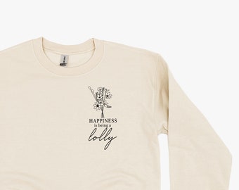 Style bouquet - Le bonheur, c'est d'être une LOLLY - Col ras du cou POLAIRE DE BASE | T-shirt graphique Lolly | Cadeau Fête des Mères | Cadeau pour sucette | J'aime mon équipe |