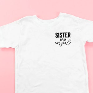Sister of an Angel (Singular Version) - Short Sleeve Child Shirt | Grief Gift | Shirts for Little Girls | Angel Sister | Sibling Loss |