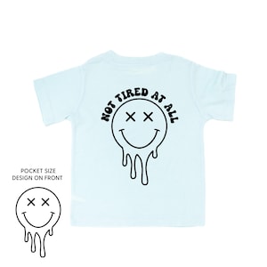 Not Tired At All (w/ Melty X Eye Smiley) - Short Sleeve Child Shirt | Kids Graphic Tee | Retro Vibes Shirt | Kids Summer Shirt | No Nap Club