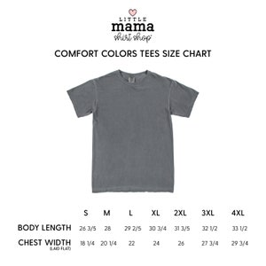 May include: A gray Comfort Colors t-shirt displayed on a white background. The image includes a size chart with measurements for body length and chest width in inches for sizes S through 4XL. The Little Mama Shirt Shop logo is at the top.