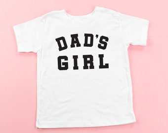 Dad's Girl - VARSITY - 半袖子供用シャツ | 幼児用女の子用シャツ | 小さな女の子用シャツ | ベビーガール用シャツ |