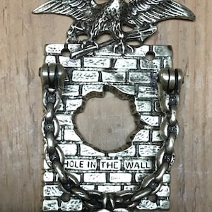 Vintage brass door knocker historic hole in the wall gang outlaws Butch Cassidy Sundance kid Wild West Jesse James Wyoming western home deco