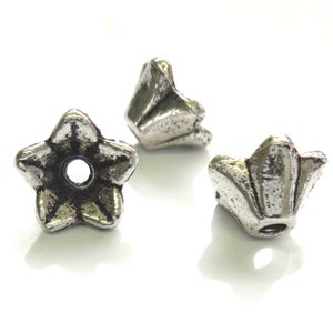 40 Tibetan Silver 9x5mm Flower Beads Jewellery Making image 1