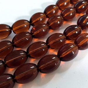 66 Glass Oval Beads 16x12mm Topaz