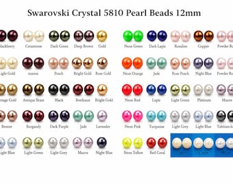 May include: A color chart of Swarovski Crystal 5810 Pearl Beads 12mm, displaying numerous pairs of spherical beads in various finishes including blackberry, creamrose, neon green, gold, and white, with each color labeled below the bead pairs.