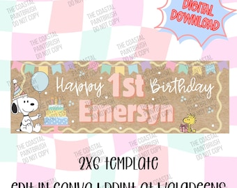May include: A rectangular banner template featuring a kraft paper background with a Snoopy character wearing a party hat, a blue balloon, a birthday cake, and Woodstock holding a gift. The text reads Happy 1st Birthday Emerson, 2x6 template, edit in Canva, print at Walgreens.