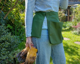 Delantal para cinturón de herramientas de jardinería: Lona de algodón verde con bolsillos móviles.