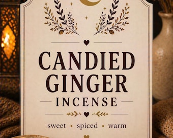 May include: A cream-coloured sign for Candied Ginger Incense, featuring a crescent moon and botanical designs. The sign has brown text and decorative elements. A bowl of candied ginger, fresh ginger, and spices are in the foreground.
