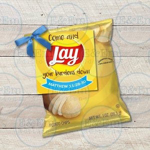 May include: A yellow bag of Lay's potato chips with a blue bow and a tag that says "Come and Lay your burdens down Matthew 11:28-30".