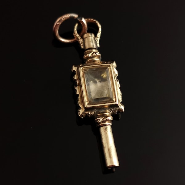 Antique 9ct gold watch key pendant, paste