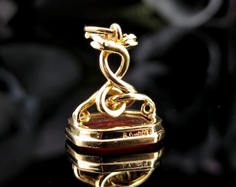 Antique 18ct gold seal fob, double entwined snakes, Carnelian