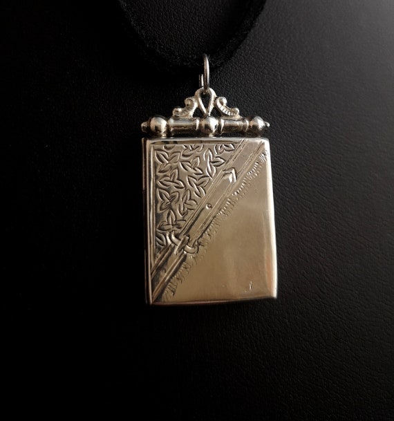 Vintage silver locket, book shaped
