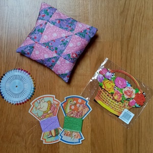 Sewing kit including pin cushion made from vintage patchwork and vintage thread