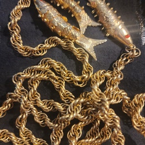 Gold articulated fish necklace