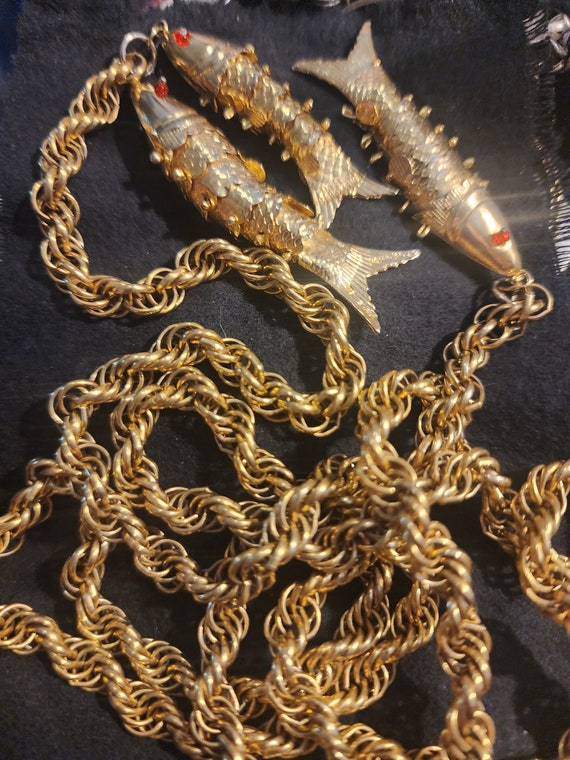 Gold articulated fish necklace