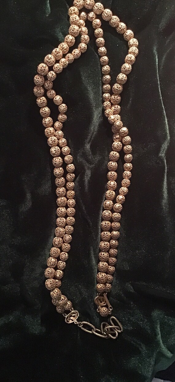 Gold beaded necklace - image 2