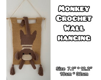 Gehäkelter Affe als Wanddeko fürs Kinderzimmer