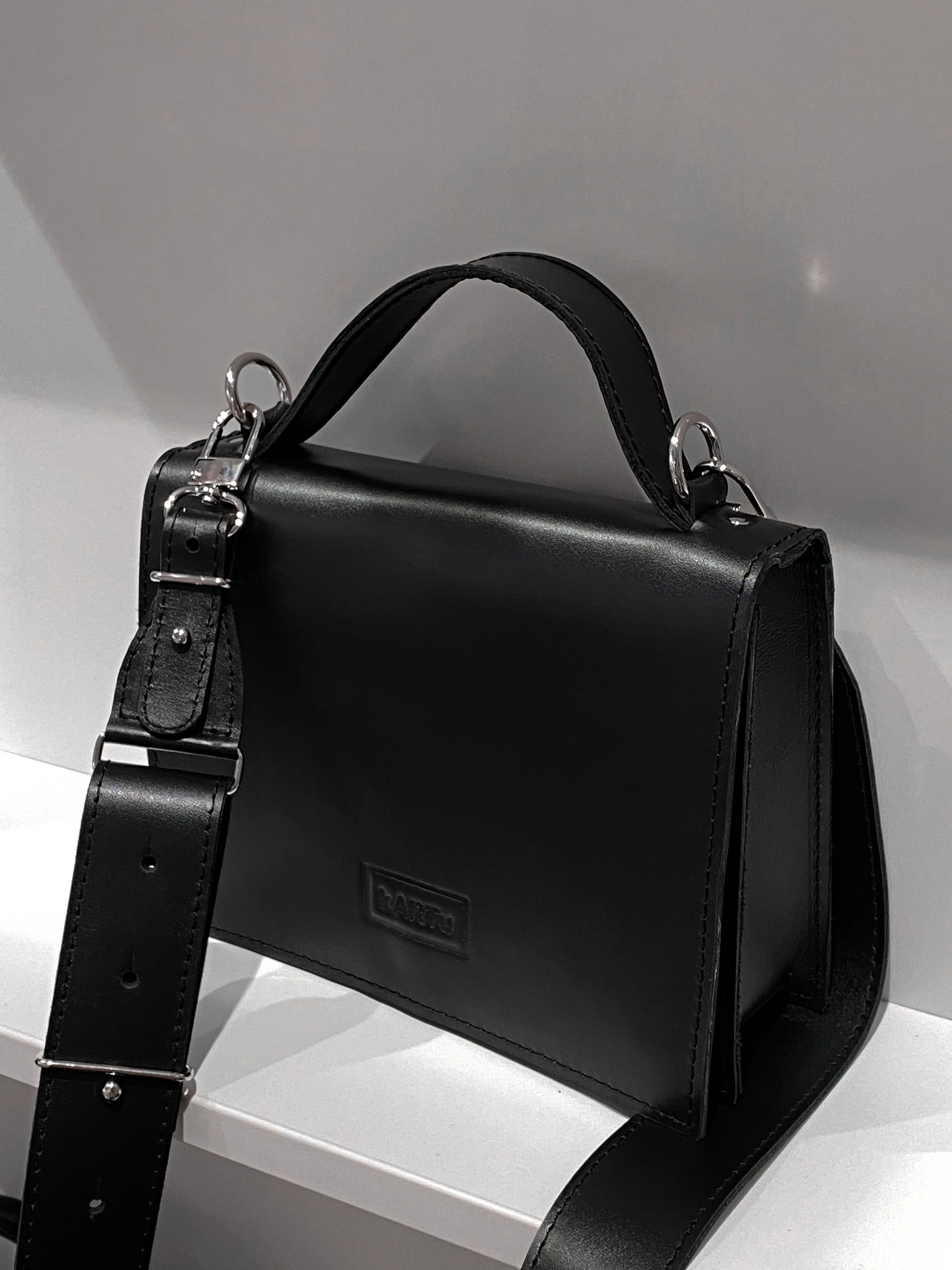 Square black handbag sale
