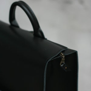 Natural leather backpack, handbag with strict interesting shapes, bag made of natural Italian leather.