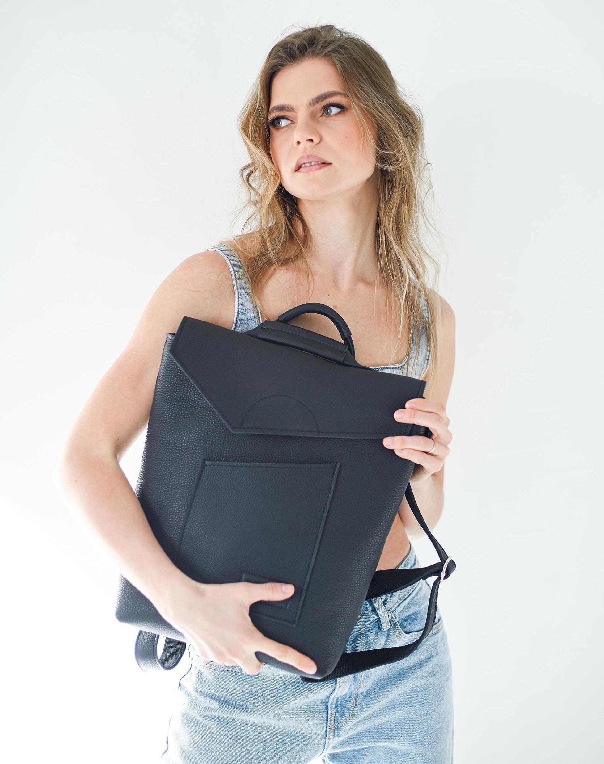 black leather fold over backpack The Top The for generations. Made in Finland. KASPERI Handcrafted in Europe. Laptop Backpack Kin Sia Foldover