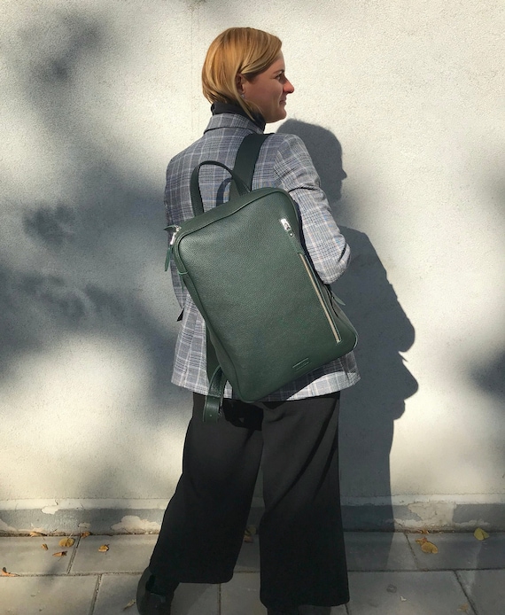 dark green leather backpack