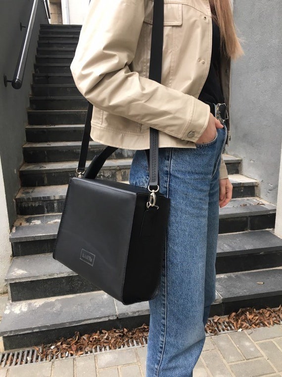 Square clearance black bag