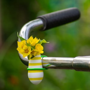 1x two color bike vase for on your bike with colored elastic binder. Pick one out of 28 color combinations. Durable plastic. Mood tracker image 1