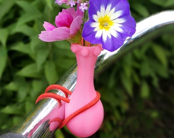 Bike vase for on your bicycle with colored elastic binder.