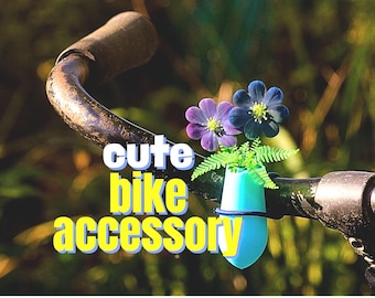 Cykelvas med blommotiv för styret. Perfekt present till motorcyklister. Ljusblått tillbehör.
