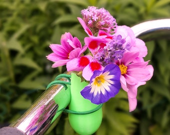 3-Pack Colored bike vase for on your bicycle full with flowers. 3D printed model available in 13 colors and elastic binders. Easy to attach.