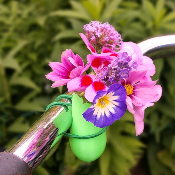 3-Pack Colored bike vase for on your bicycle full with flowers. 3D printed model available in 13 colors and elastic binders. Easy to attach.