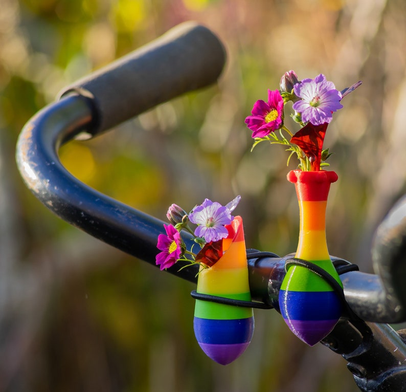 little vase for on your bike. Bike has the colors of the rainbow.