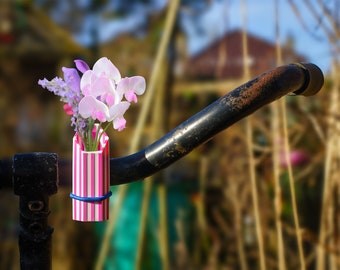 1x two-color bike vase with vertical stripes. Colored White-Magenta, or choose your combo and elastic binder color