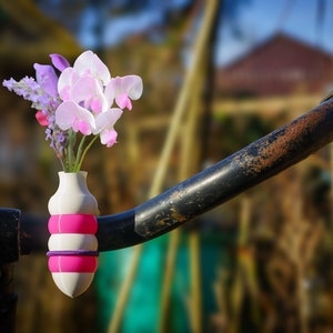 1x two-color bike vase bulb version. Colored White-Magenta, or choose your combo and elastic binder color image 1