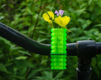 Bike vase transparent green V2 for your bicycle with a colored elastic binder.