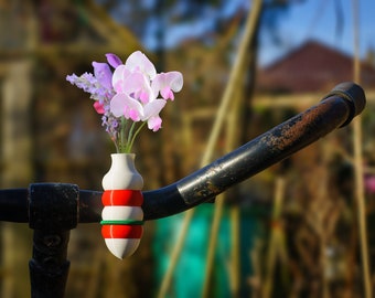 1x two-color bike vase bulb version. Colored White-Red, or choose your combo and elastic binder color