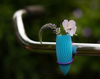 3-Pack spiral bike vase for on your bicycle with colored elastic binder.