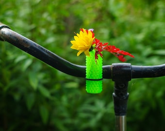 1x Bike vase transparent green V1 for your bicycle with a colored elastic binder.