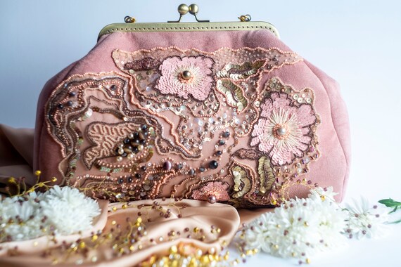 gold embellished clutch bag