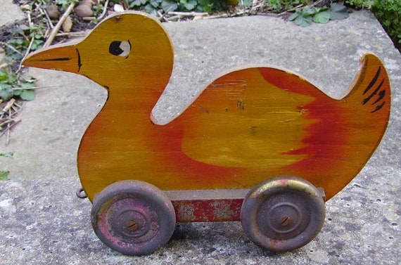 wooden toy duck on wheels