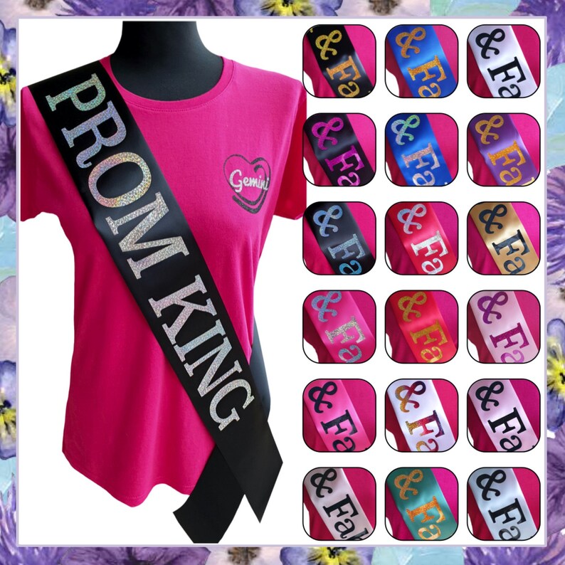 May include: A black satin sash with silver glitter lettering that reads "PROM KING". The sash is shown on a pink t-shirt with a small heart design that says "Gemini". The sash is also shown in 12 different colors.