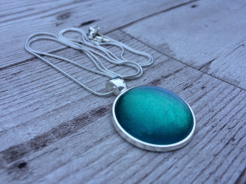 colour shifting multichrome holographic shimmer Surf slick necklace or ring cabochon jewellery handcrafted with indie polish