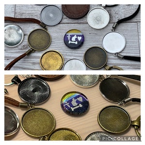 May include: Assortment of round, silver, gold, and black metal blanks for crafting jewelry. The blanks are in various sizes and have different patterns. Some blanks have a swirl pattern, while others have a sunburst pattern. There are also two round, iridescent glass cabochons with a white design of a bone, paw print, and heart.